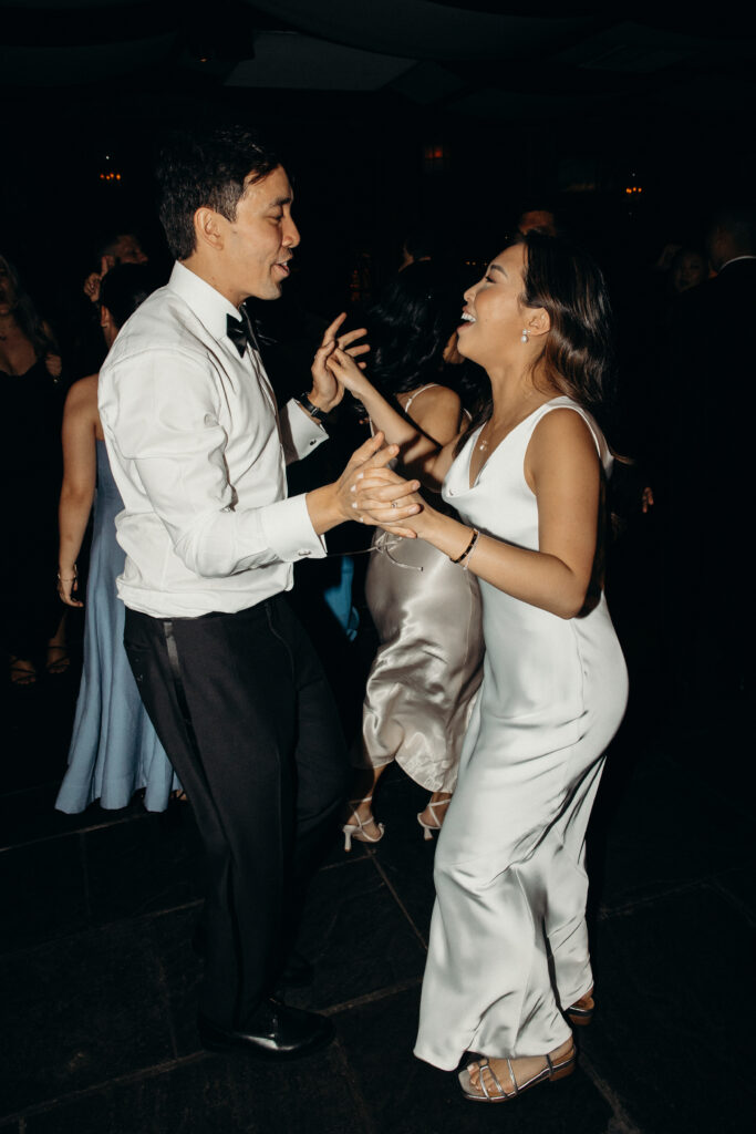 NYC wedding photographer captures evening reception at The River Café NYC