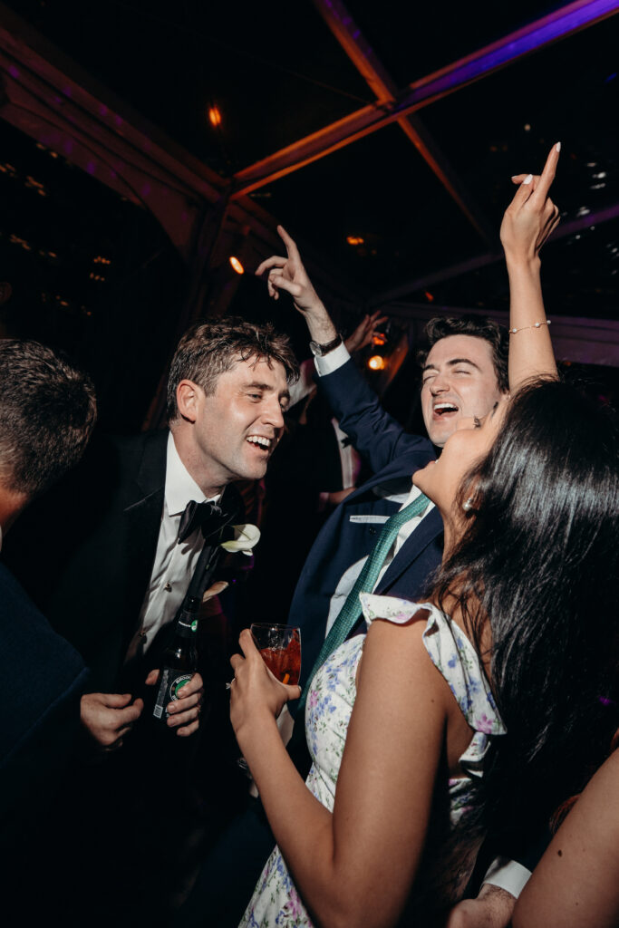 NYC wedding photographer captures evening reception at 620 Loft & Garden