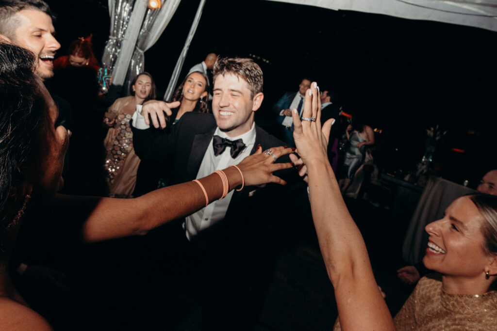 NYC wedding photographer captures evening reception at 620 Loft & Garden