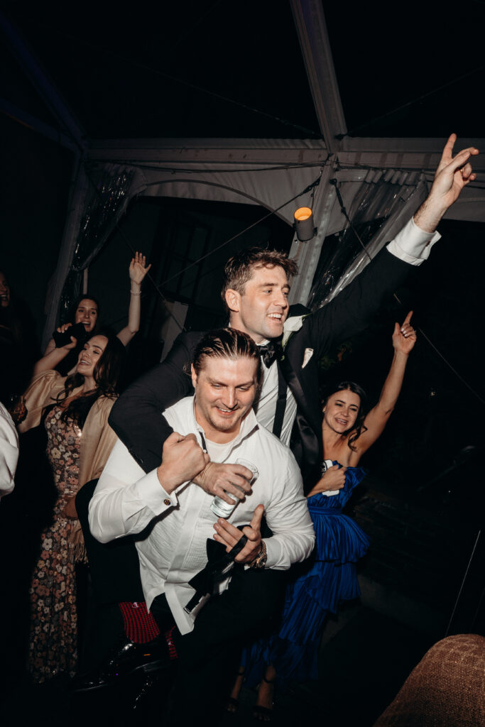 NYC wedding photographer captures evening reception at 620 Loft & Garden