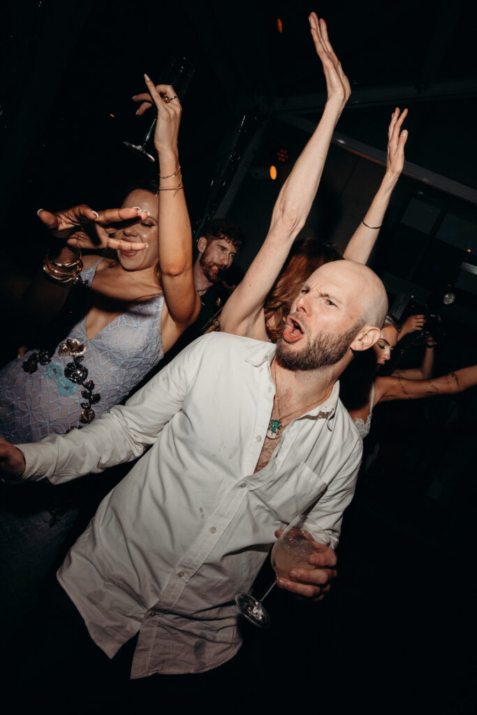 NYC wedding photographer captures evening reception at 620 Loft & Garden