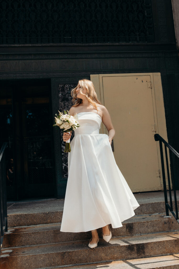 NYC elopement photographer photographing the bride at NYC City Hall