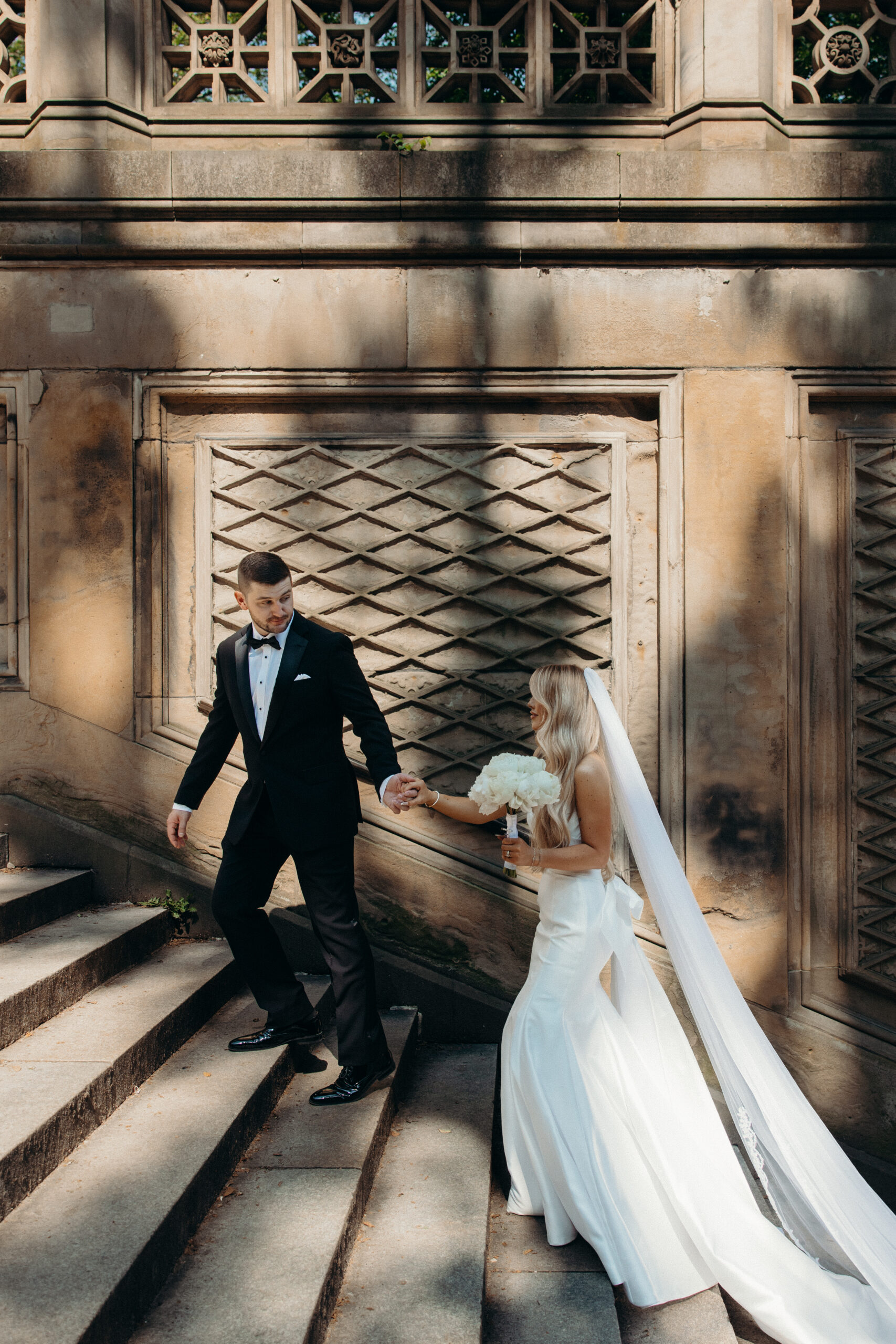 NYC elopement photographer captures the couple during their Central Park elopement.