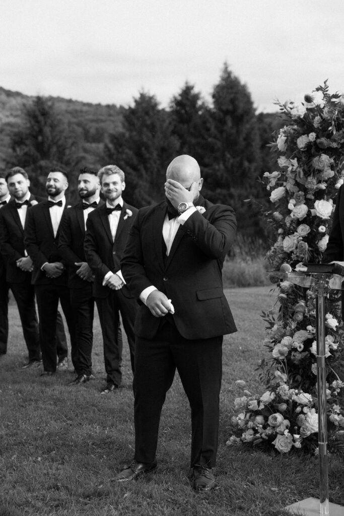 Groom cries during wedding ceremony at Stonewall Estate