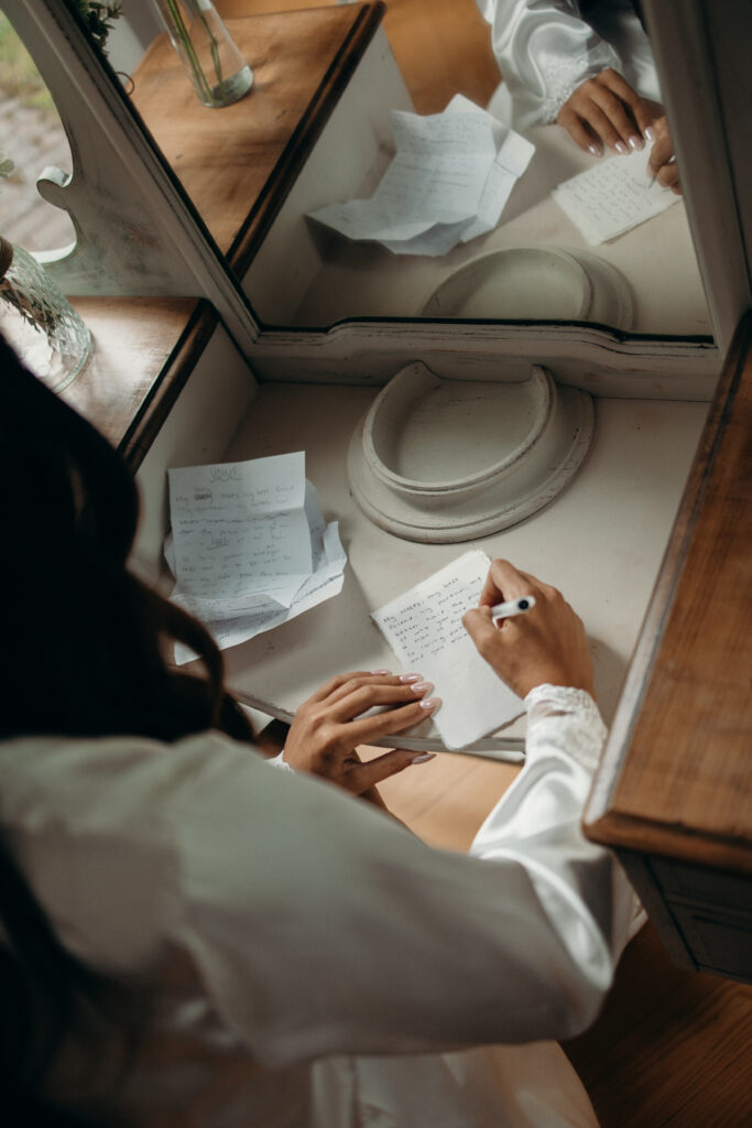 Bride writes her vows at Stonewall Estate