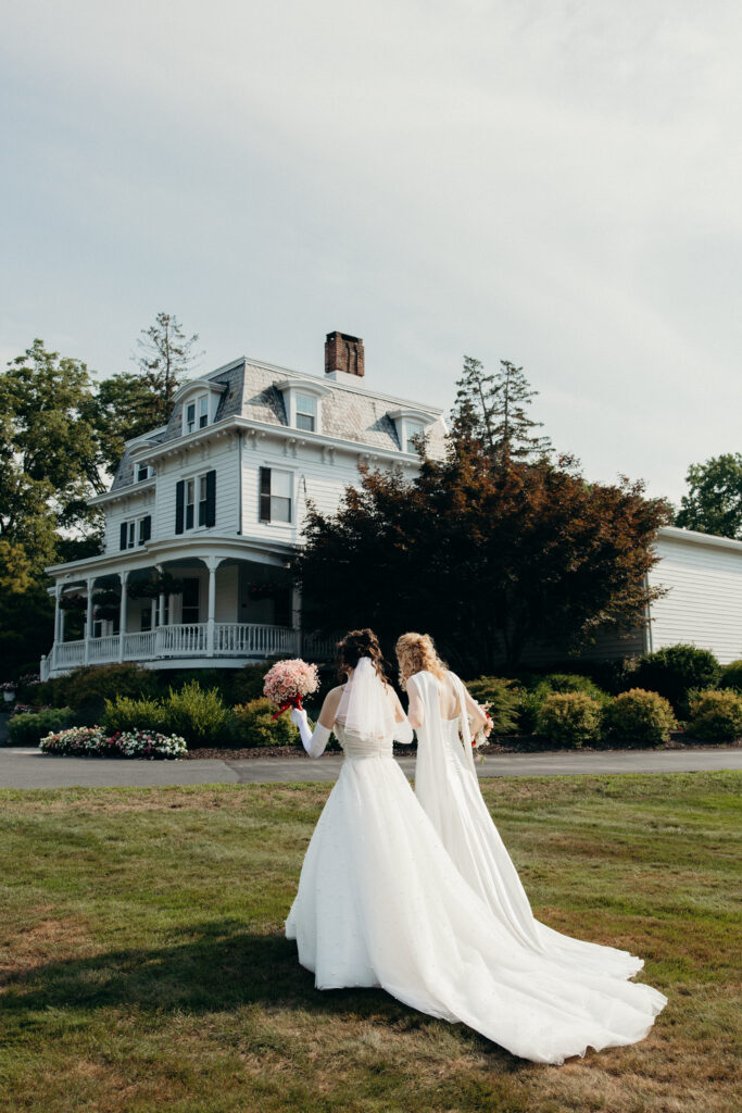Brides walking together at Mountainville Manor