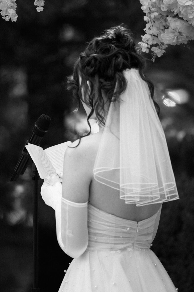 Bride reading her vows at Mountainville Manor