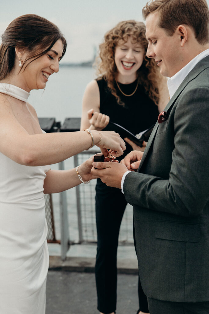 NYC couple exchange rings during their Red Hook elopement ceremony in Brooklyn
