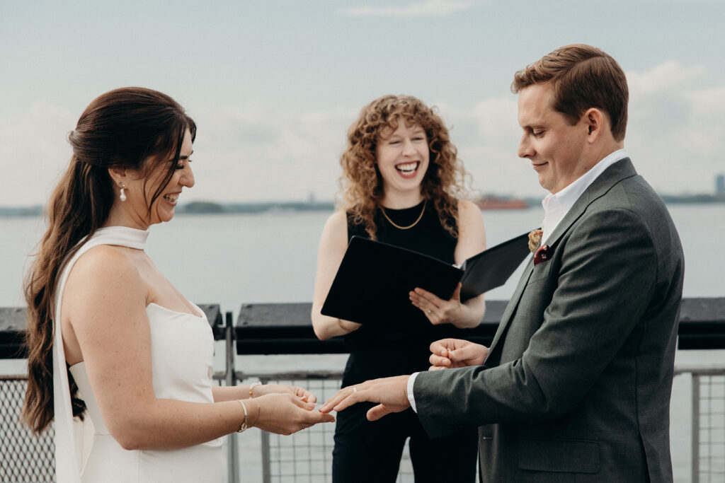 NYC couple exchange rings during their Red Hook elopement ceremony in Brooklyn