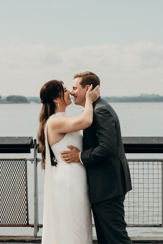 NYC couple share their first kiss during their Red Hook elopement ceremony in Brooklyn