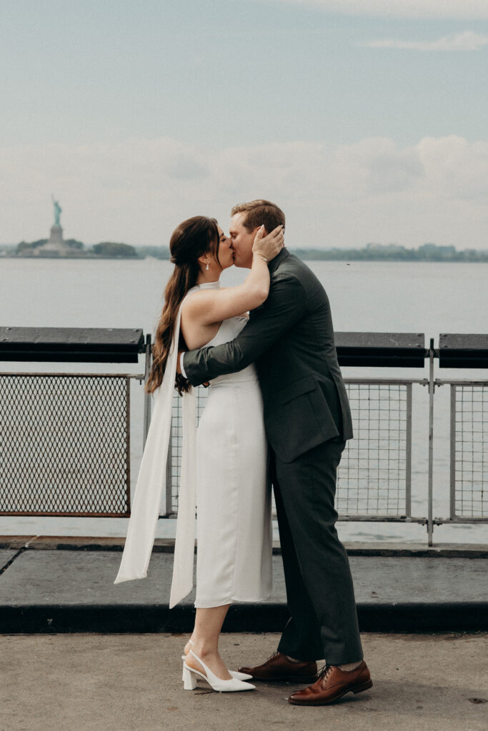 NYC couple share their first kiss during their Red Hook elopement ceremony in Brooklyn