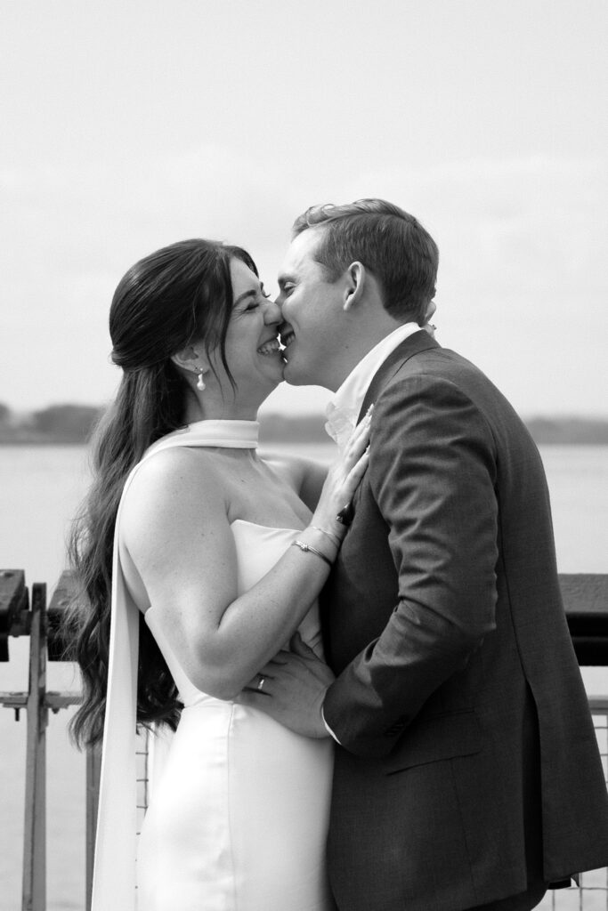 NYC couple share their first kiss during their Red Hook elopement ceremony in Brooklyn