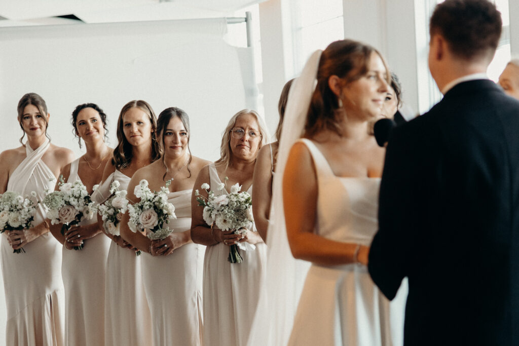 Bridesmaids line up during the wedding ceremony at Maritime Parc
