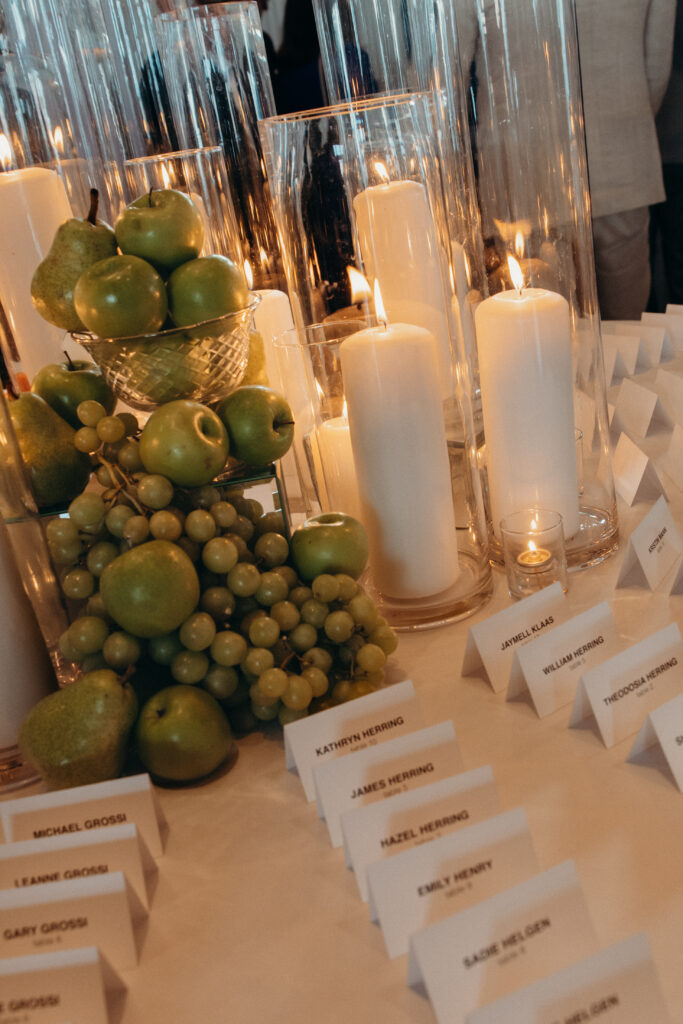 Fruit display with candles during the wedding cocktail hour at Maritime Parc