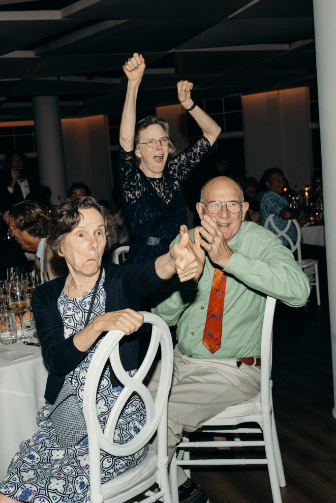 Guests react during their evening wedding reception at Maritime Parc