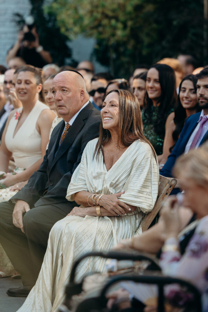 Wedding guests reacting during the wedding ceremony at the Radio Star