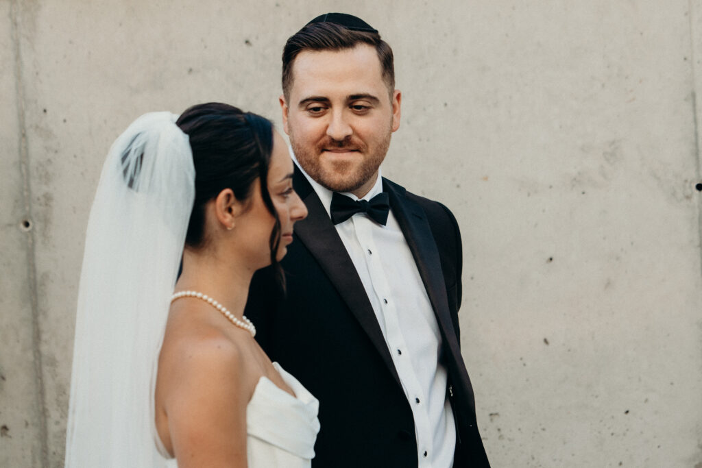 Groom looking at the bride at the Radio Star wedding