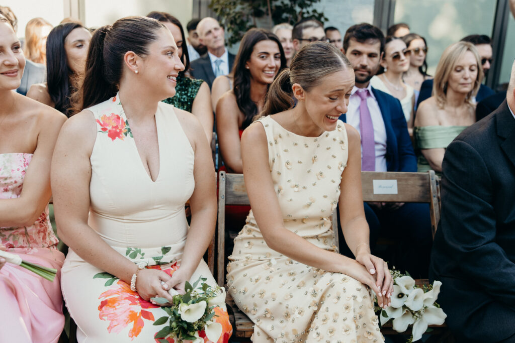 Wedding guests reacting during the wedding ceremony at the Radio Star
