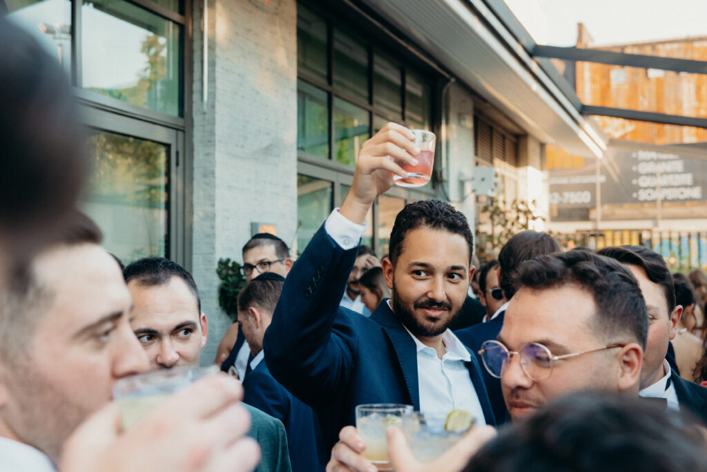 Wedding guests interacting at the Radio Star cocktail hour