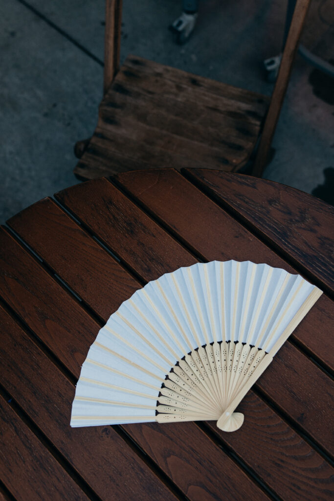 Wedding fan at the Radio Star cocktail hour