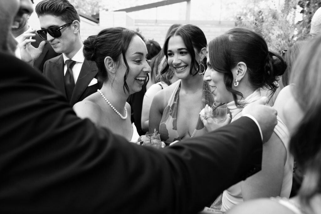 Bride and guest interacting at the Radio Star cocktail hour