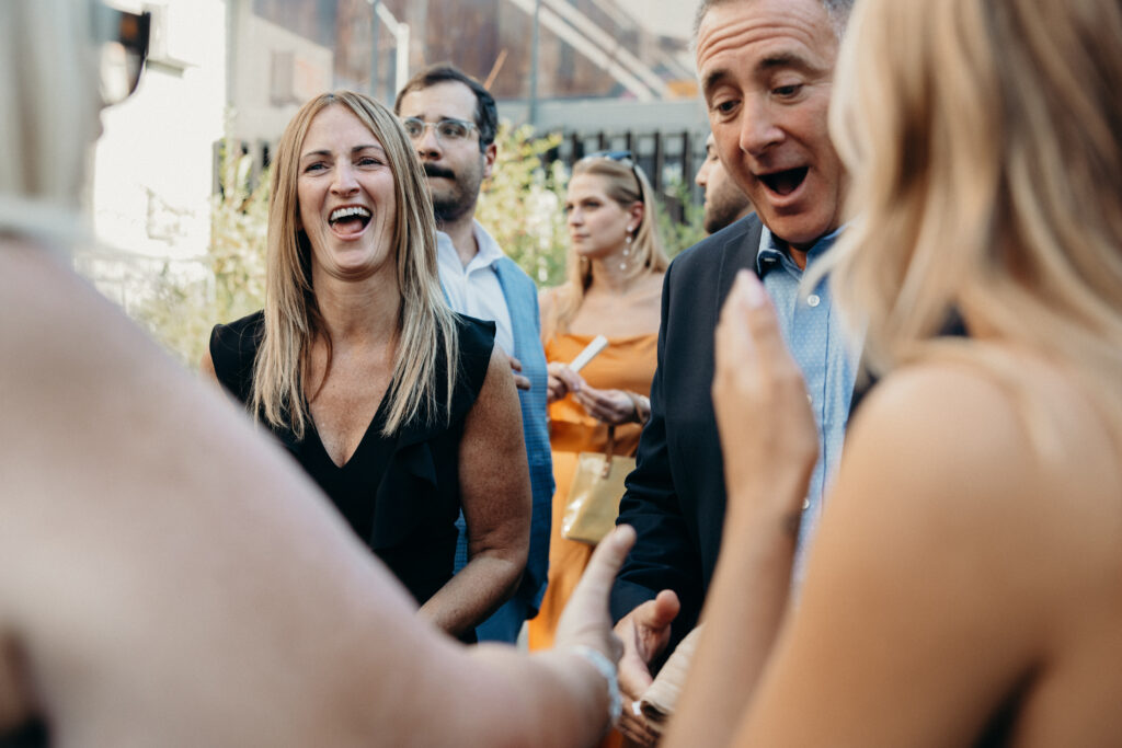 Wedding guests interacting at the Radio Star cocktail hour