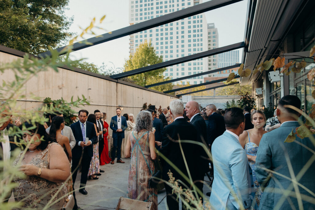 Wedding guests interacting at the Radio Star cocktail hour