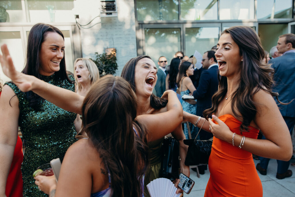 Wedding guests interacting at the Radio Star cocktail hour