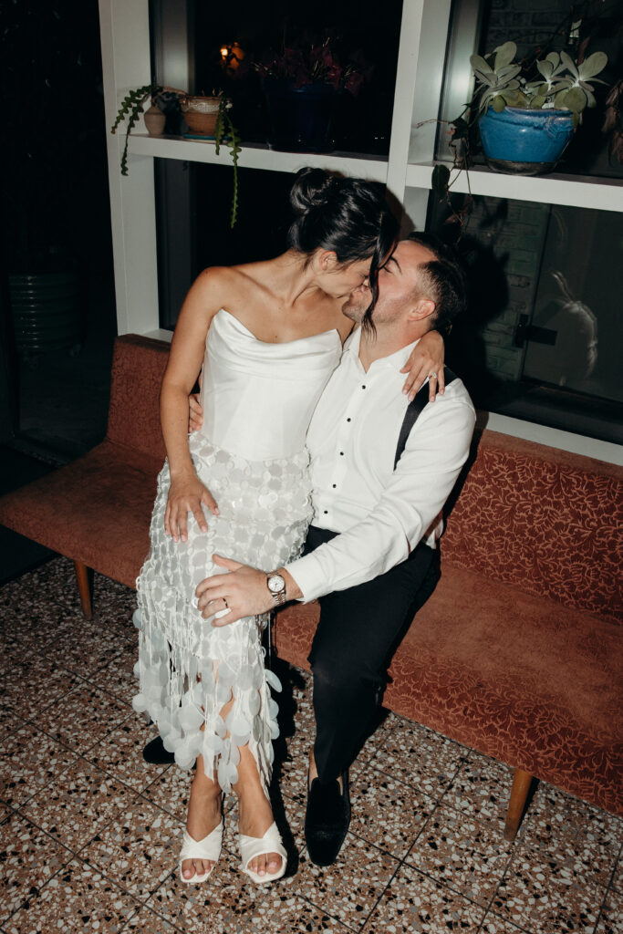 Couple kissing at the Radio Star wedding reception