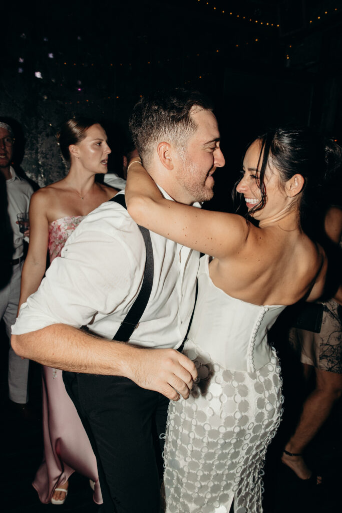 Couple dancing at the Broken Land wedding after-party