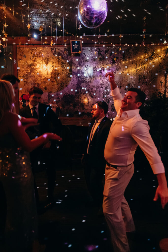 Wedding guests dancing at the Broken Land wedding after-party