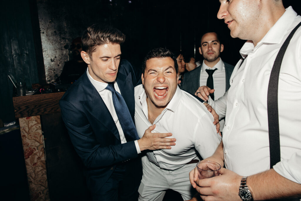 Wedding guests partying at the Broken Land wedding after-party