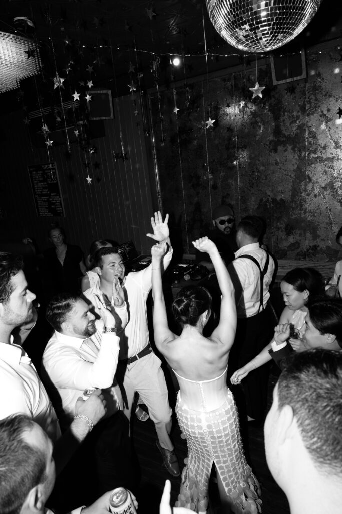 Couple dancing at the Broken Land wedding after-party
