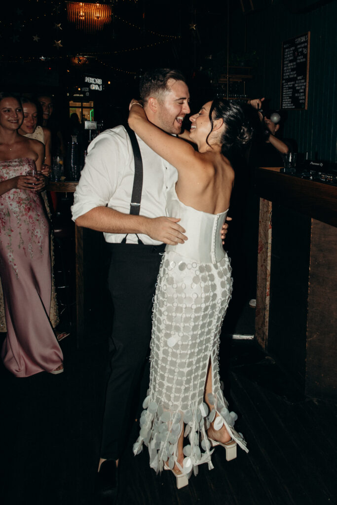 Couple dancing at the Broken Land wedding after-party
