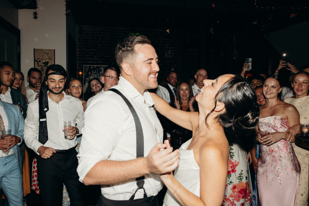 Couple dancing at the Broken Land wedding after-party