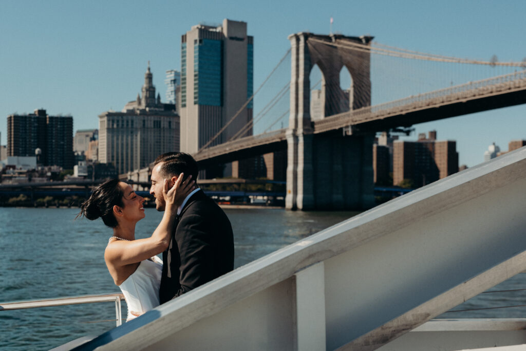 Couple riding a ferry from Seaport to Greenpoint for their Radio Star wedding