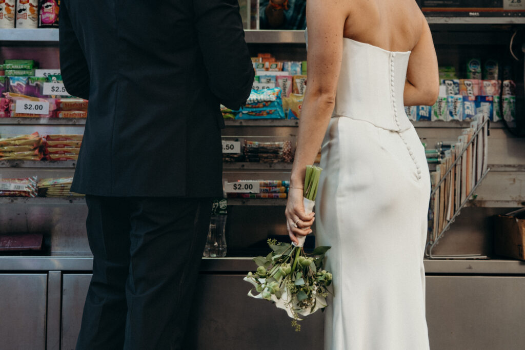 Couple ordering food at a food stand in NYC