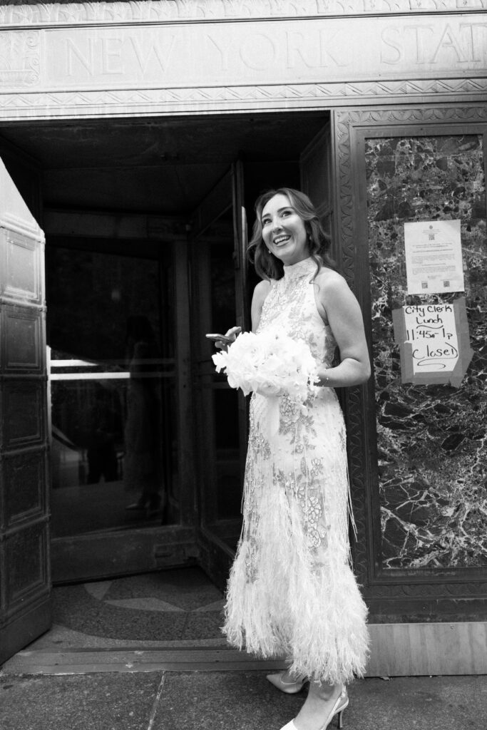 NYC bride standing outside NYC City Hall