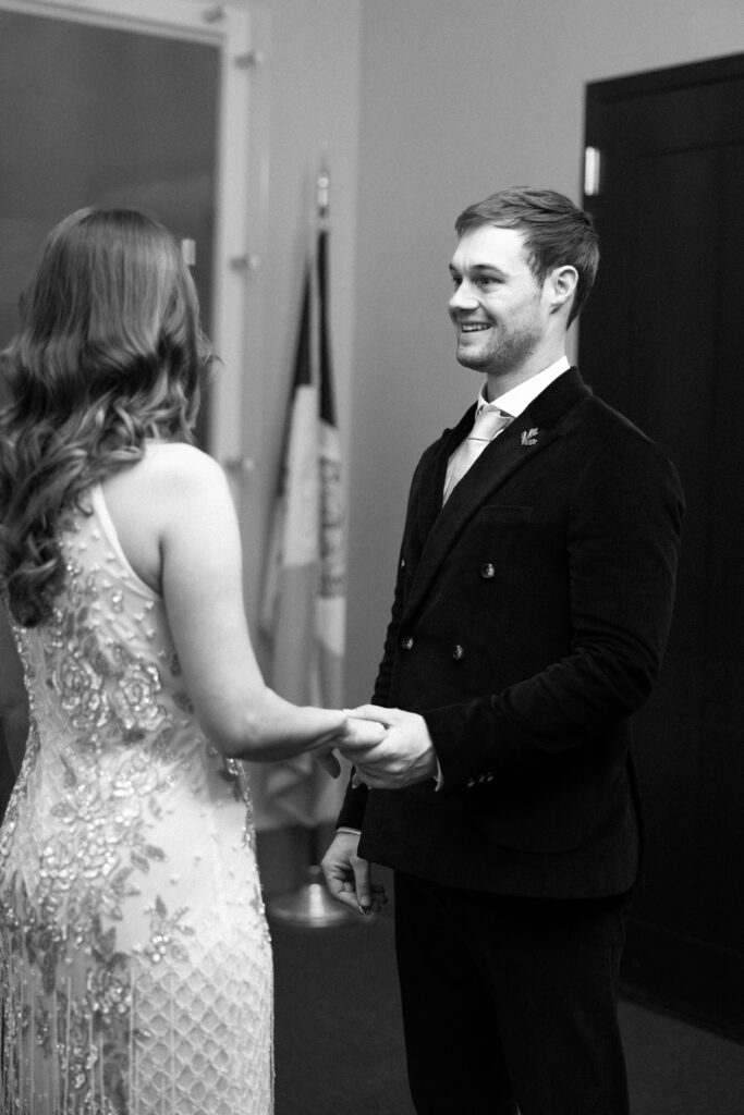 NYC couple exchanging vows during elopement ceremony at NYC City Hall