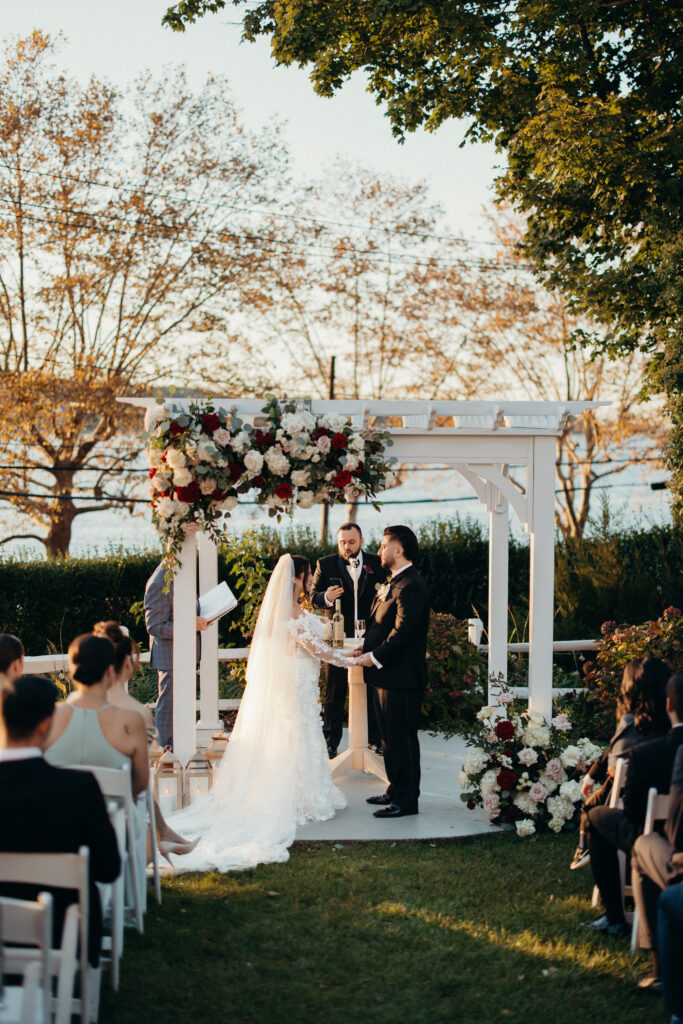 Sunset wedding ceremony at Sea Cliff Manor