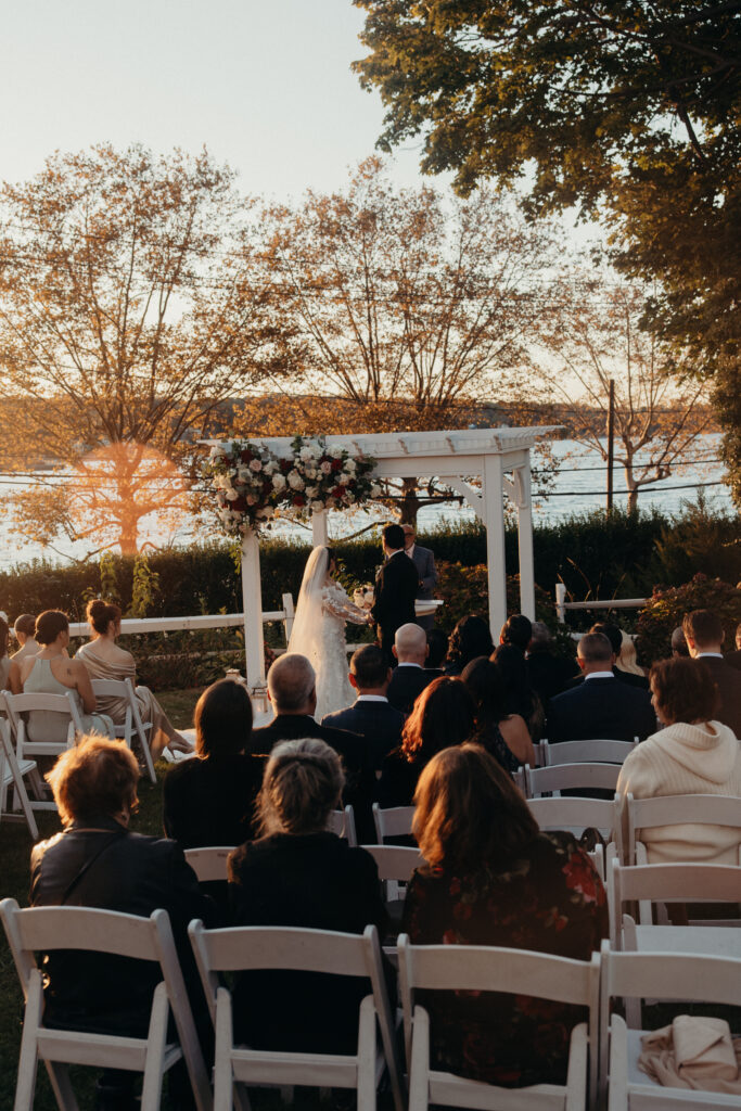Sunset wedding ceremony at Sea Cliff Manor