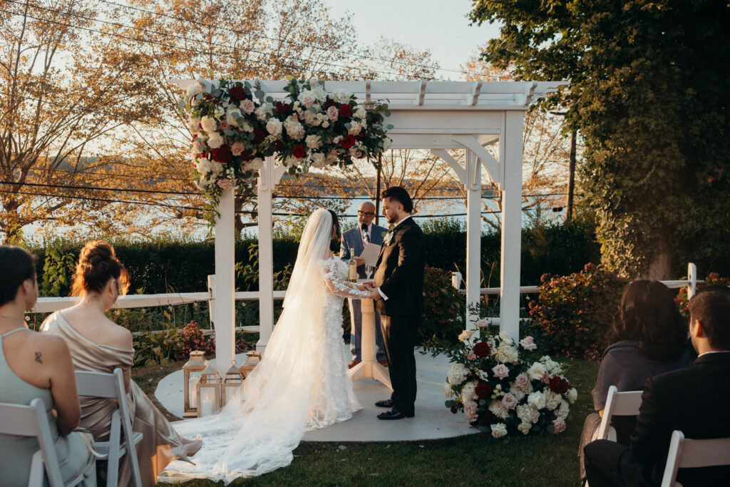 Sunset wedding ceremony at Sea Cliff Manor