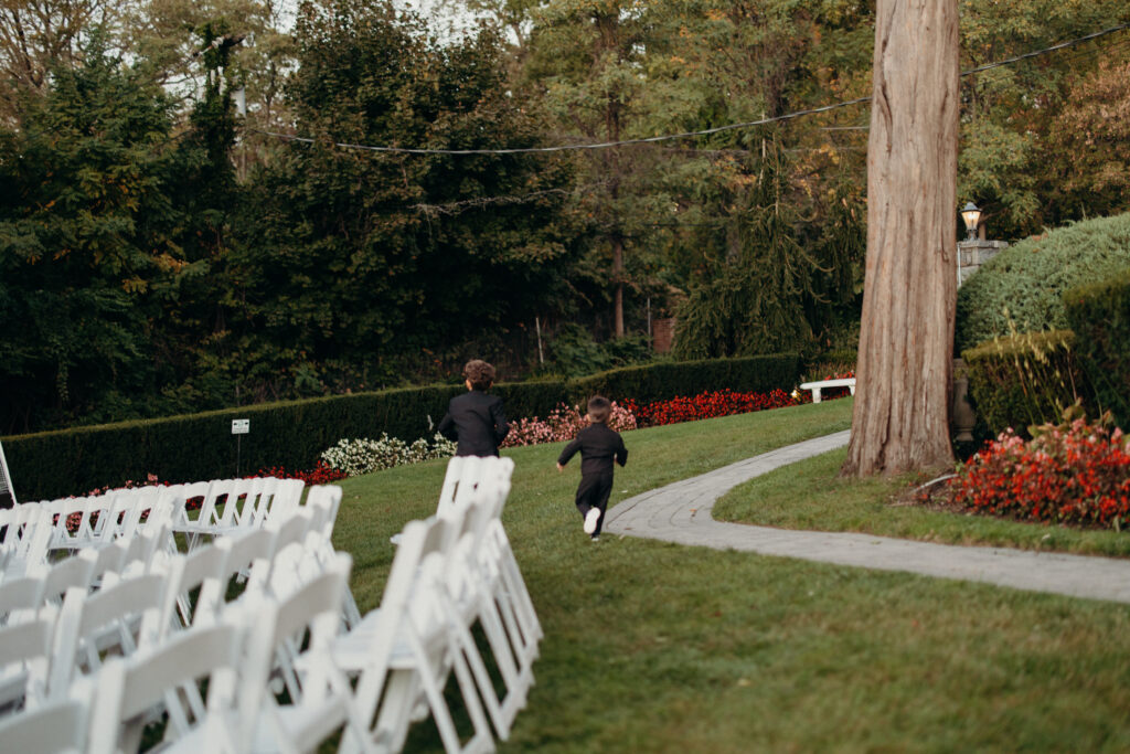 New York kid running around at Sea Cliff Manor cocktail hour