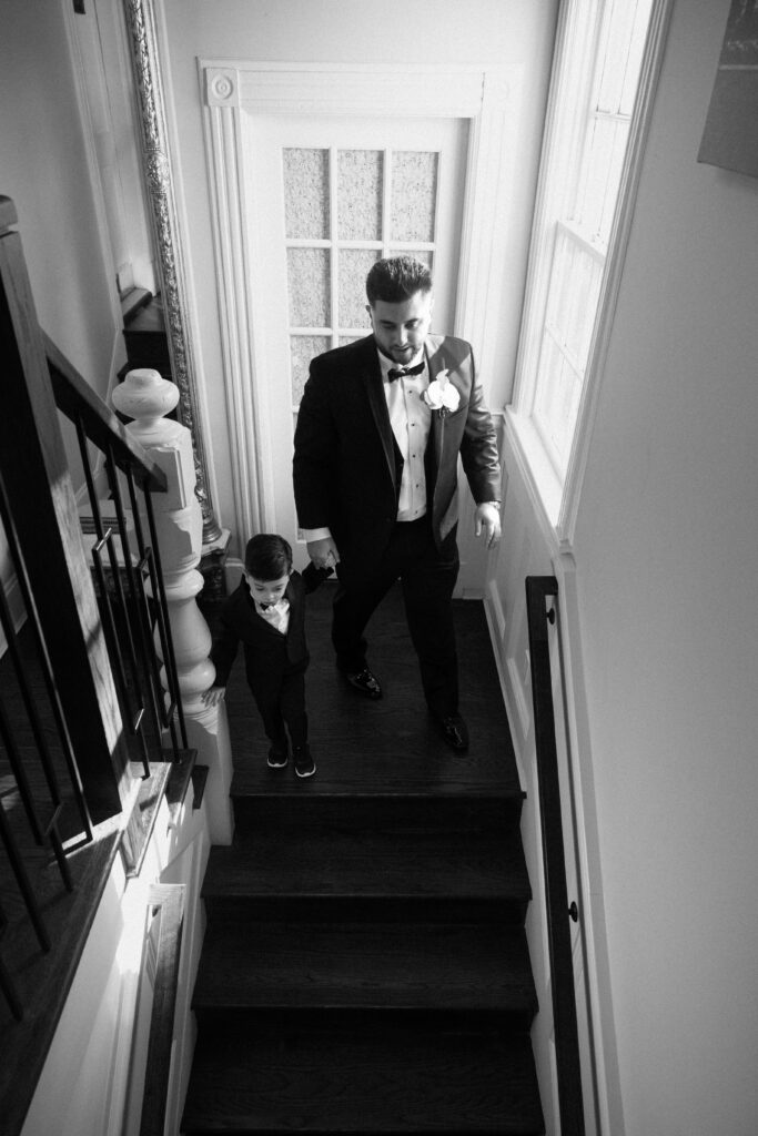 Groom and son getting ready at Sea Cliff Manor