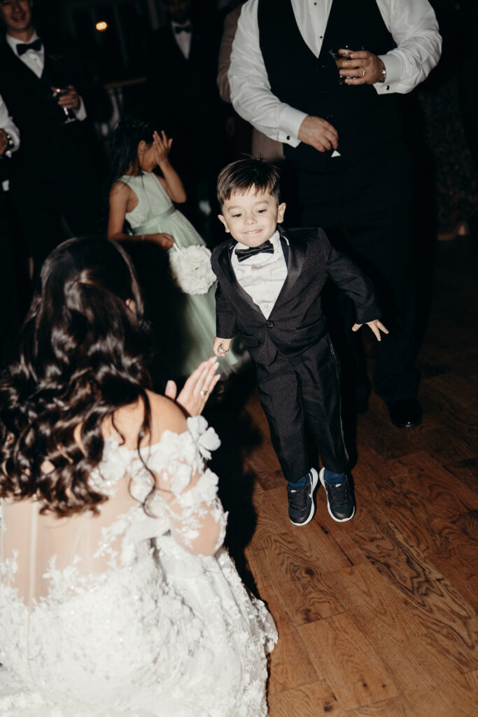 New York kid dancing at Sea Cliff Manor wedding reception