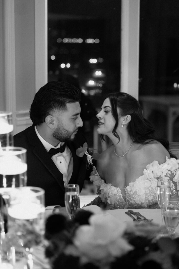 New york couple talking at their Sea Cliff Manor wedding reception