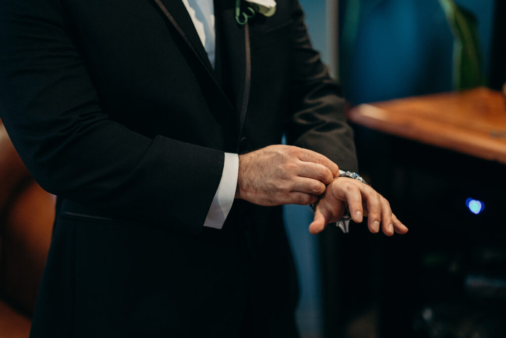 Groom getting ready at Sea Cliff Manor 