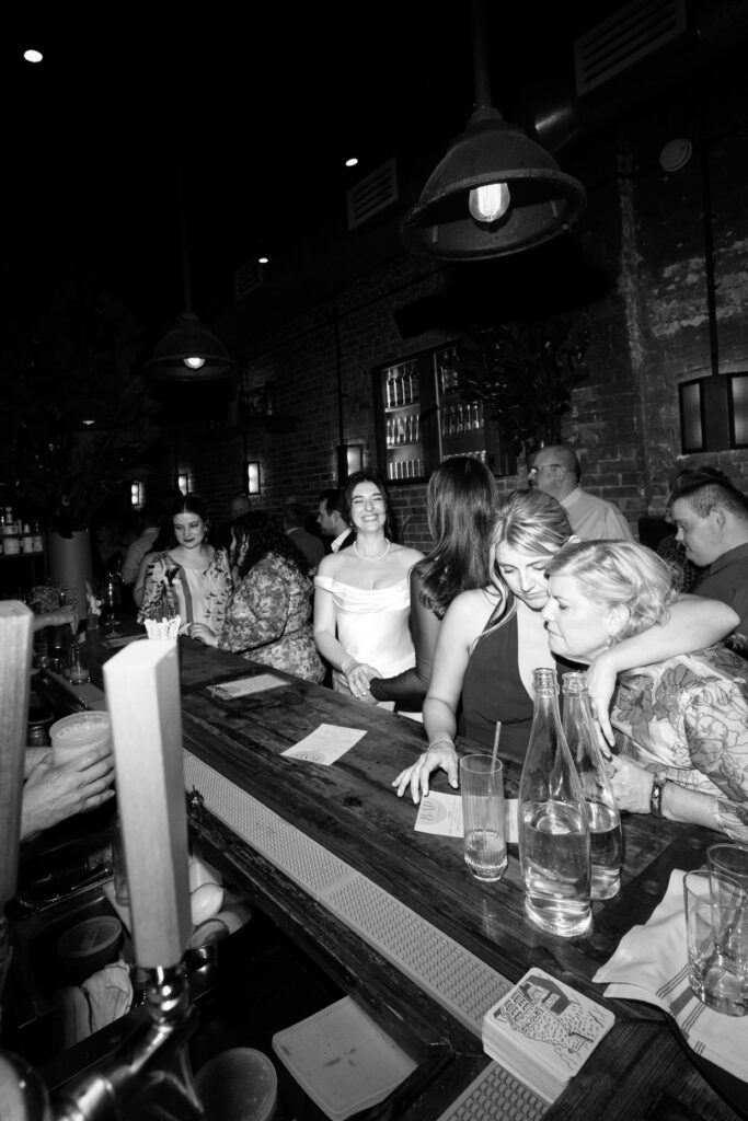Bride and wedding guests celebrating at Aurora Williamsburg