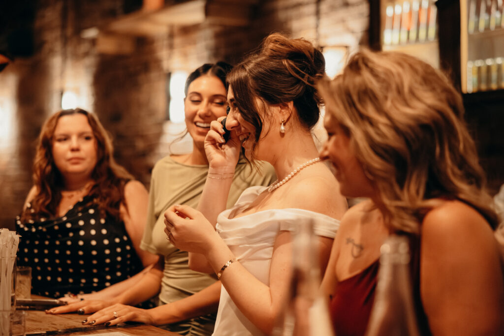 Bride and wedding guests interacting at Aurora Williamsburg