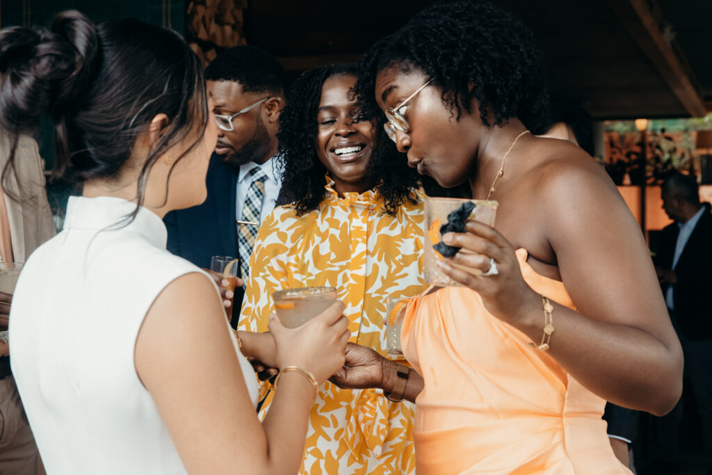 Wedding guests interacting at a Celestine DUMBO wedding reception 